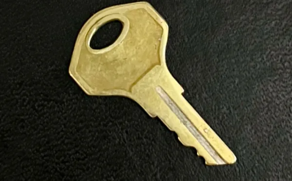 Closeup of a cash box key.