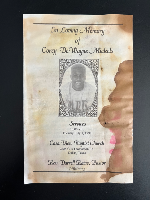 Flyer from Corey Mickels' funeral, dated July 1, 1997. The paper is water-stained.