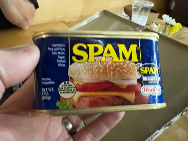 A small tin of Spam luncheon meat, which is at least 25 years old.