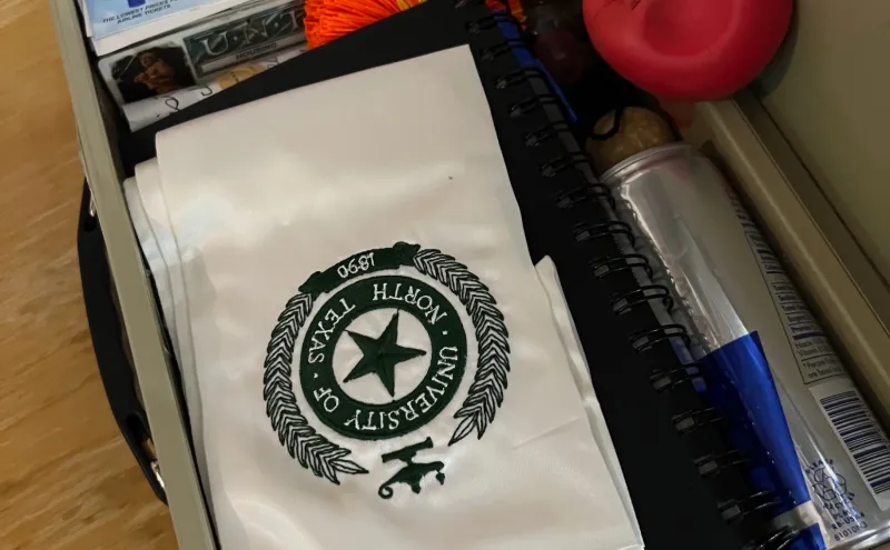 View of the packed interior of a time capsule, showing the carefully-arranged contents filling all available space.